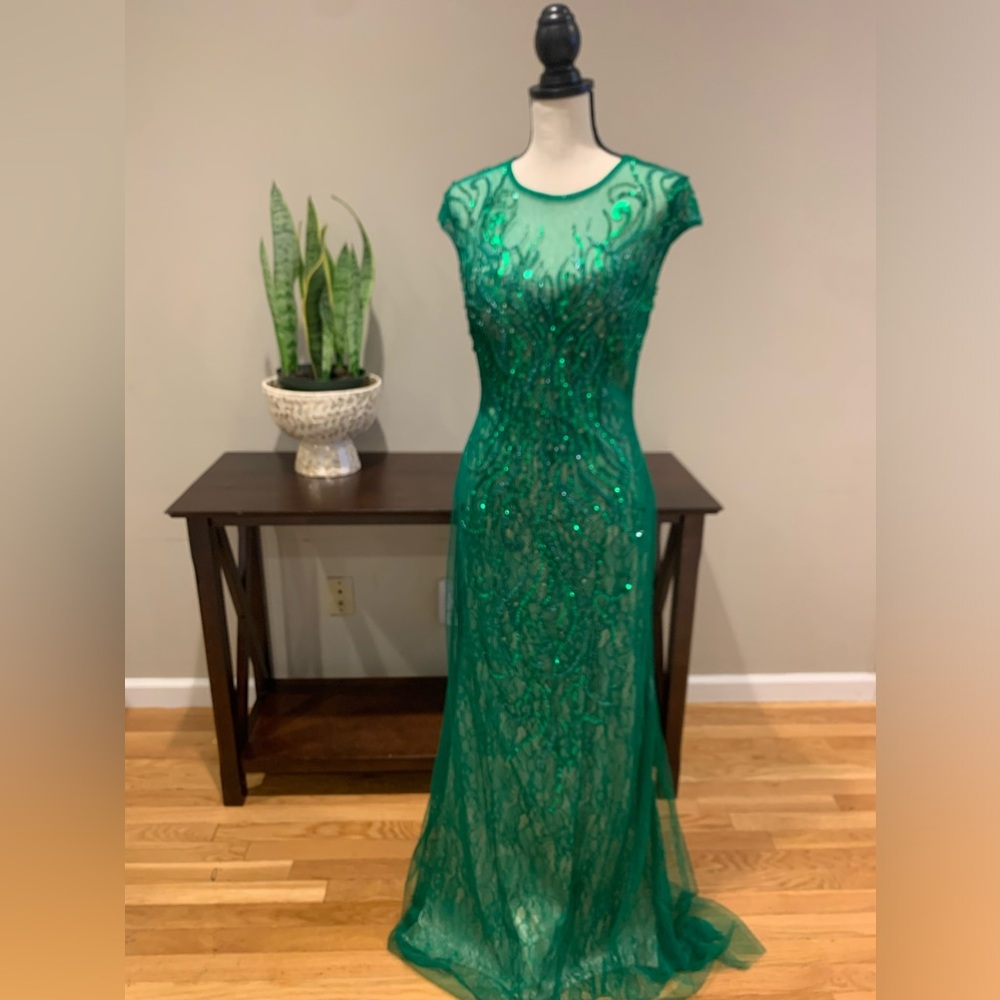 Green lace with nude underlay long evening dress. Has slight train in back